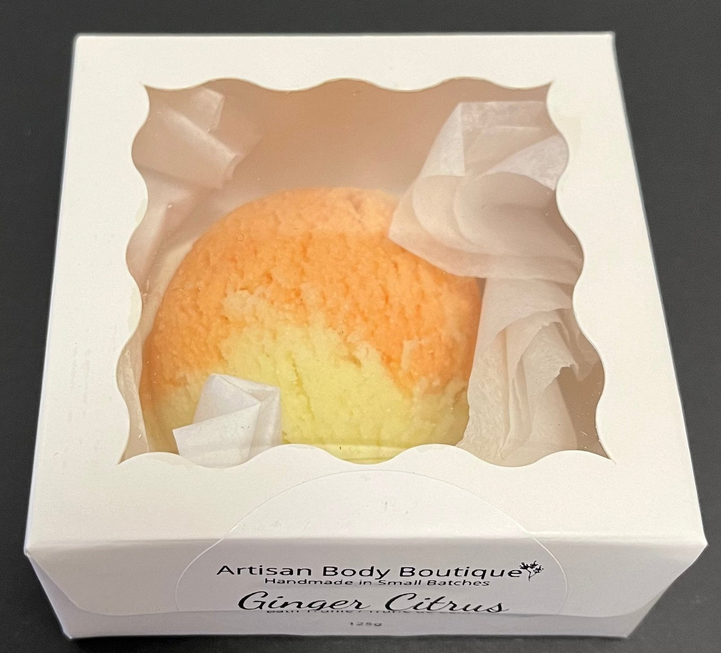 Bath Bomb Truffle in Ginger Citrus Scent with nourishing Shea butter.