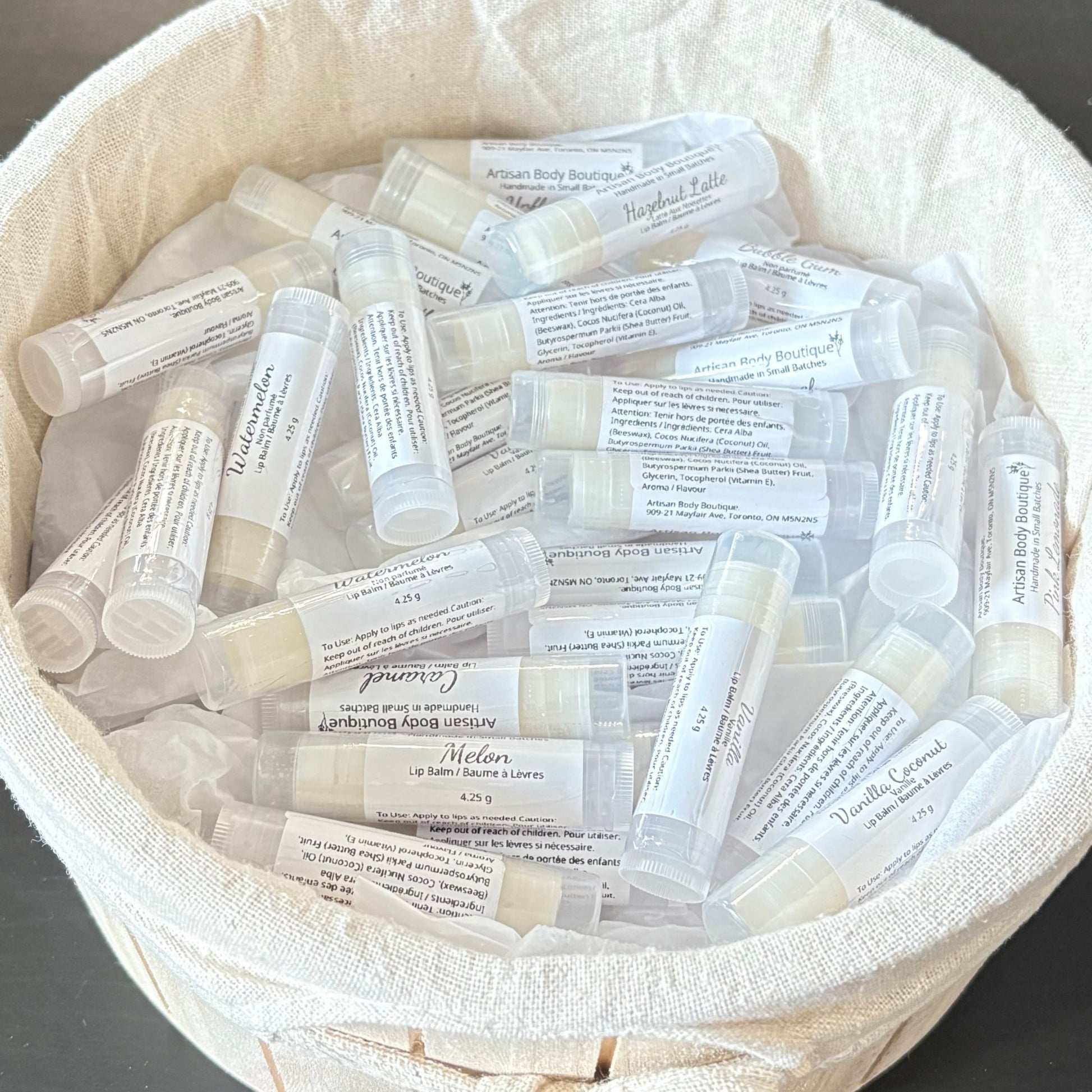 Collection of artisan lip balms – handcrafted with shea butter, coconut oil, and vitamin E